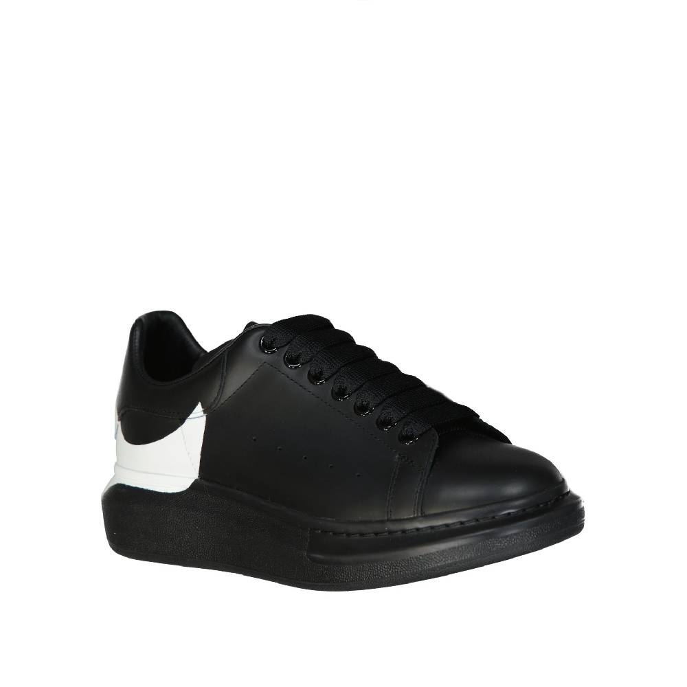 ALEXANDER MCQUEEN  Sneakers Oversize in Pelle Nera Uomo Alexander McQueen Acquista Ora