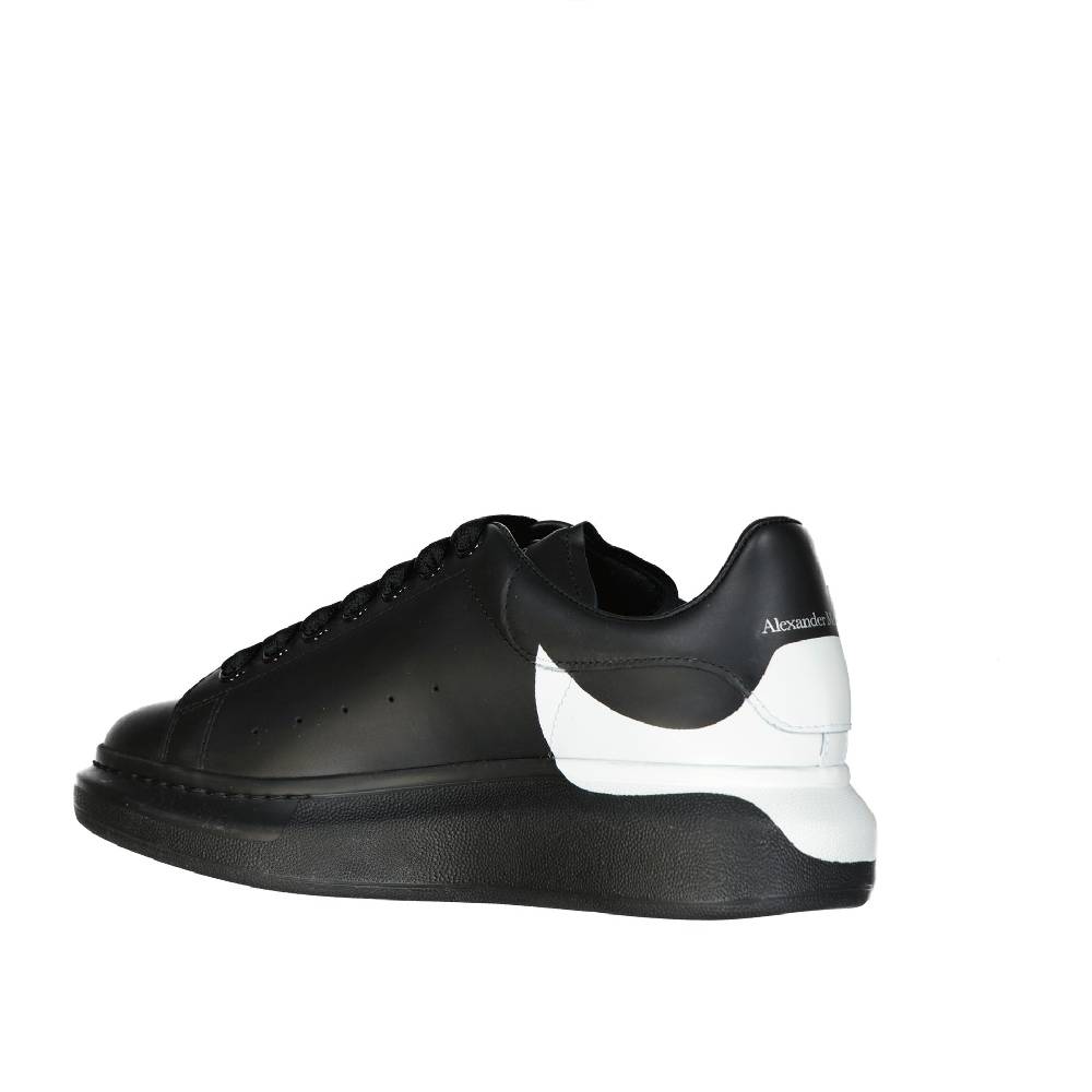ALEXANDER MCQUEEN  Sneakers Oversize in Pelle Nera Uomo Alexander McQueen Acquista Ora