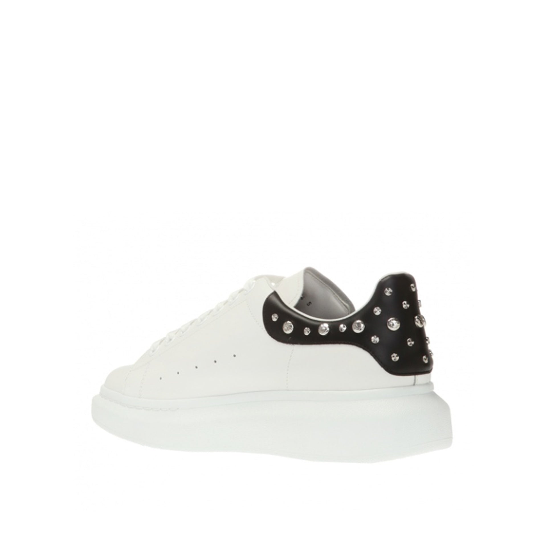 ALEXANDER MCQUEEN  Sneakers in Pelle Borchiata Bianche Alexander McQueen Uomo Promozione Limitata