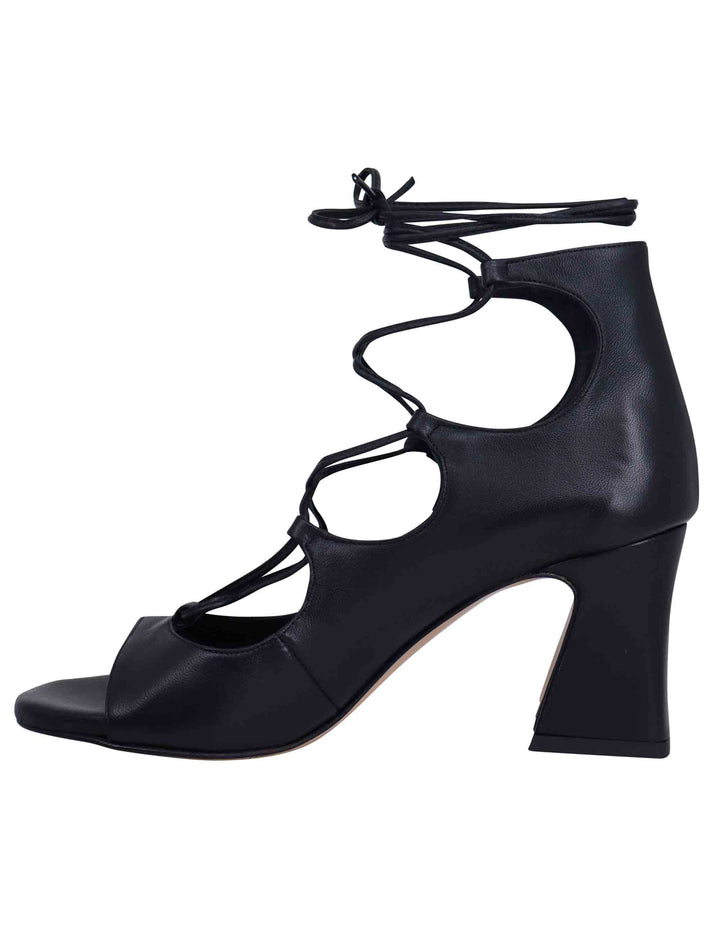 Spatarella Sandali donna in pelle nera con lacci alla caviglia e tallone chiuso In vendita